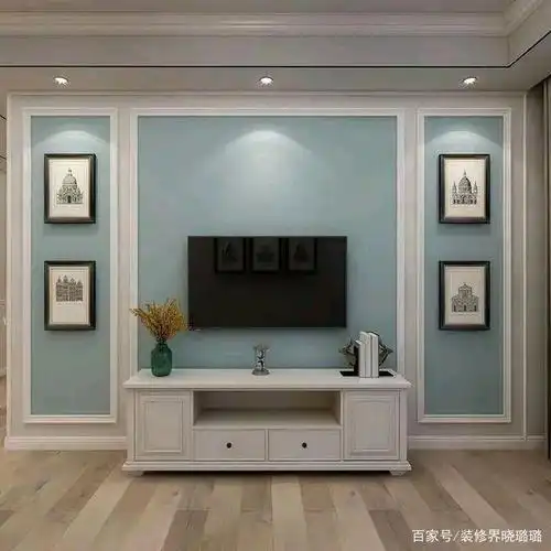 这是现代简约风格的电视背景墙 以柜子和石材做搭配简单的墙漆颜色