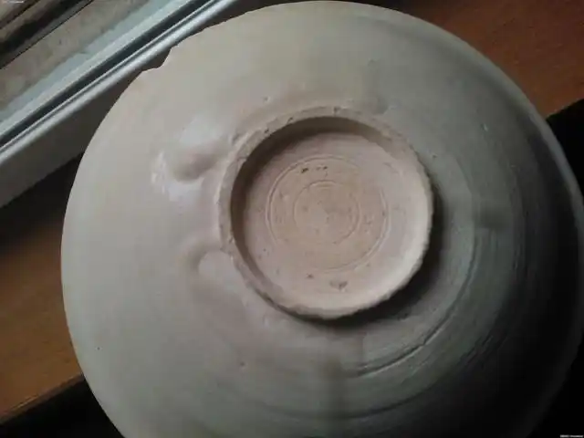 工:定窑采用覆烧法,这能提高产量,也能节约大量燃料,但由于这种工艺