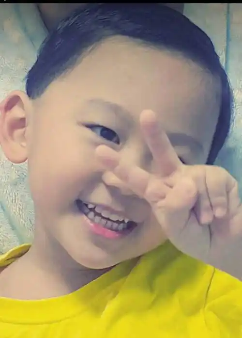 孩子的牙算齐吗,两颗虎牙正常吗