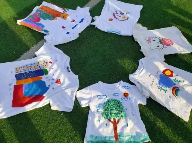 永威小学举行童心童梦绘童年手绘文化衫美术创意活动