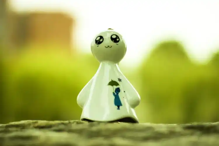 萌物情侣纪念品爆款 可爱男女雨伞卡通大号小号晴天娃娃陶瓷风铃