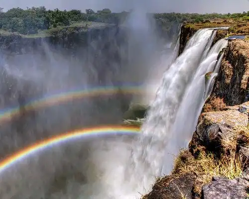 rainbow over waterfall victoria