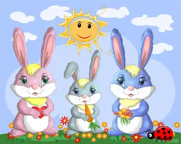 在附近的草地上有三只小兔子图片素材