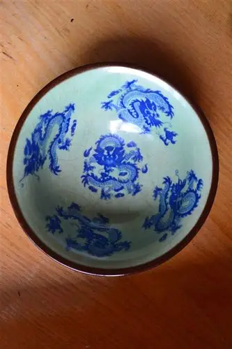 请专家帮忙分析:1,是否真品?2,若真品,市场价格约为多少?3