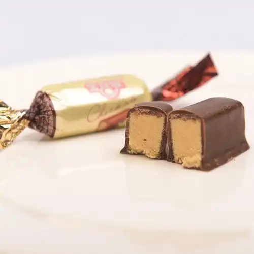 金丝猴 朱古力酥心巧克力 夹心巧克力散装250g休闲零食代可可脂