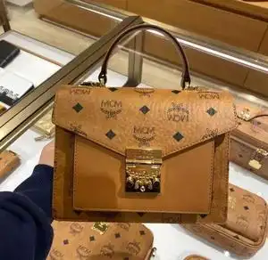 正品mcm女包 风琴链条邮差包新款单肩包mini款手提印花斜挎包
