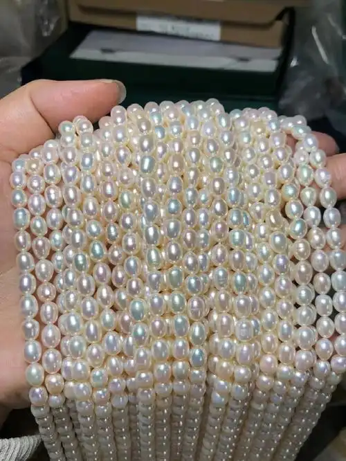 56mm极光炫彩米粒珍珠批发价出25