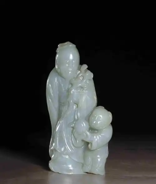 清乾隆 青白玉圆雕寿星童子人物摆件