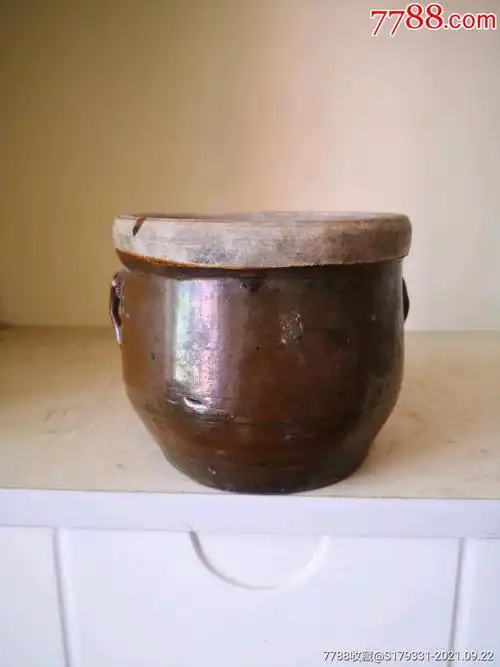 民国酱釉双耳瓷罐子包老