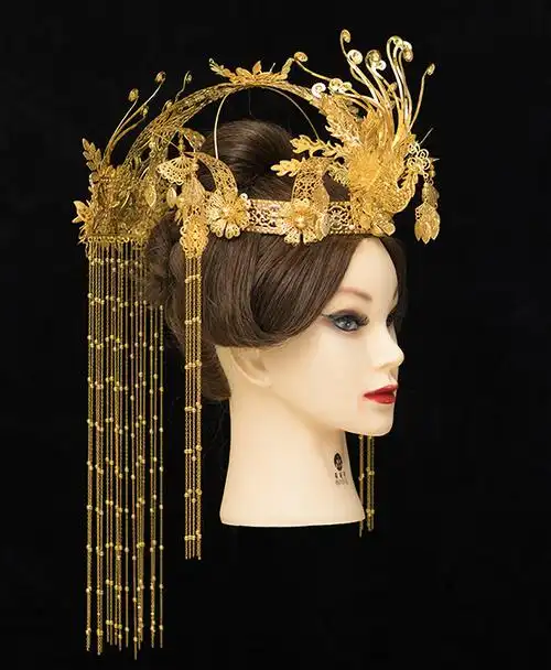 刘兰作品《凤髻》属于高髻用的一种饰品亦可释为凤凰髻上饰以金翠凤凰