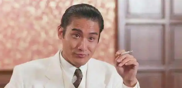 "千面影帝"梁家辉:运动写书十项全能,曾因爱国被封杀也不退缩