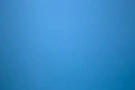 柠檬水纯色纯色石墙上的蓝色作为背景纹理.美丽的现代复古色彩照片